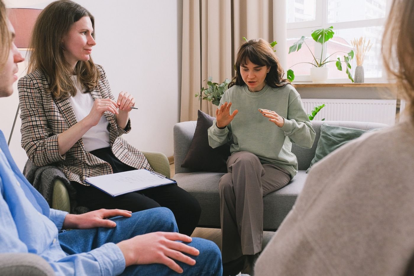 A small group sharing during a therapy session