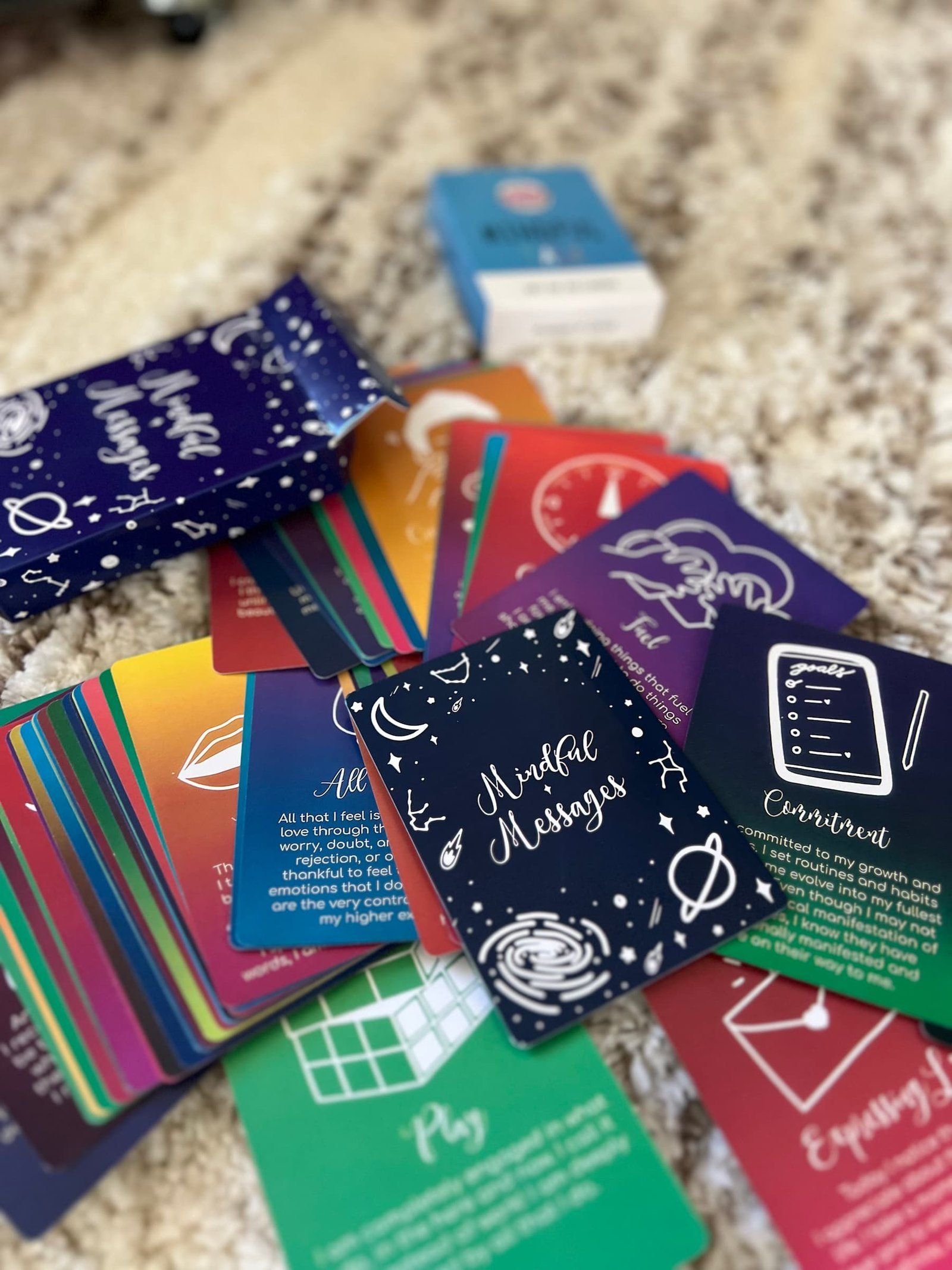 Feelings and coping cards spread on a rug
