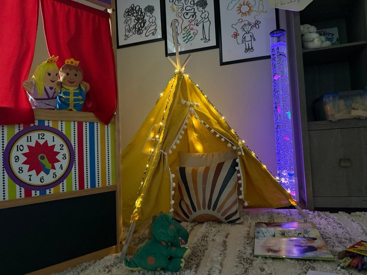 The lit reading tent and puppet theatre