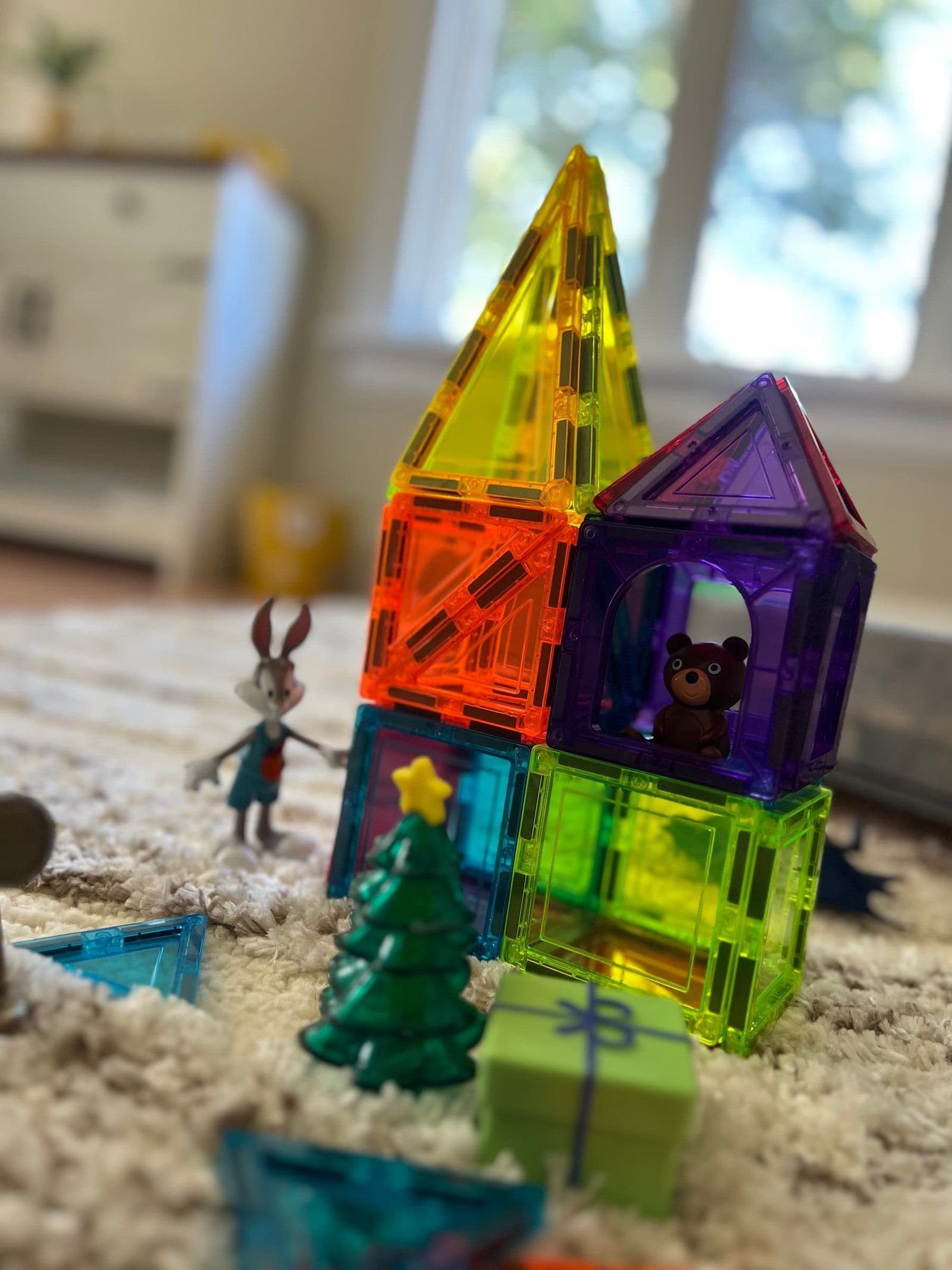 A colourful magnetic tile tower in the playroom