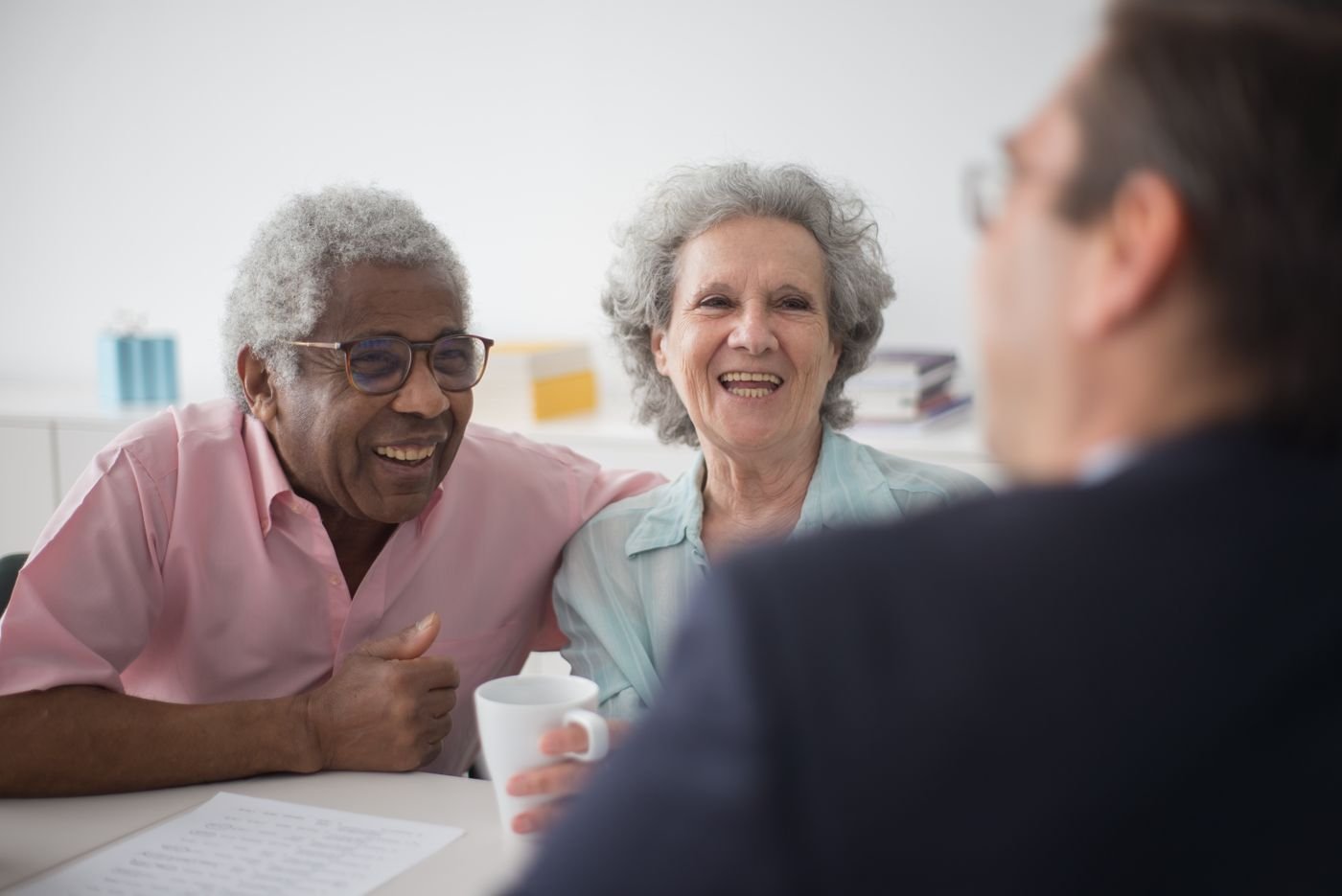 An older couple smiling during a session